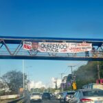 Artigo: Homens armados acompanham instalação de faixa contra Jerônimo na Paralela